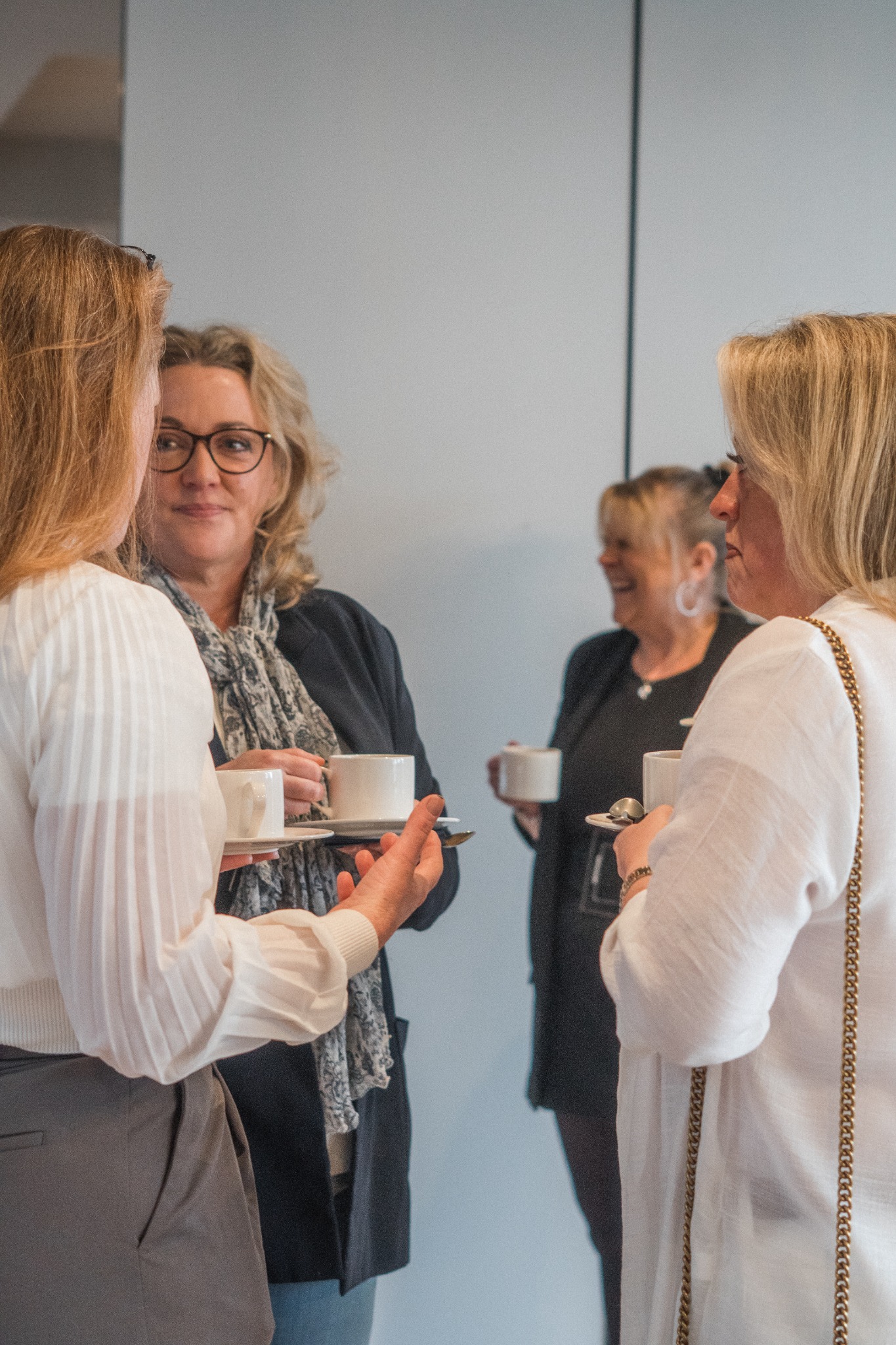 Guests connecting over coffee